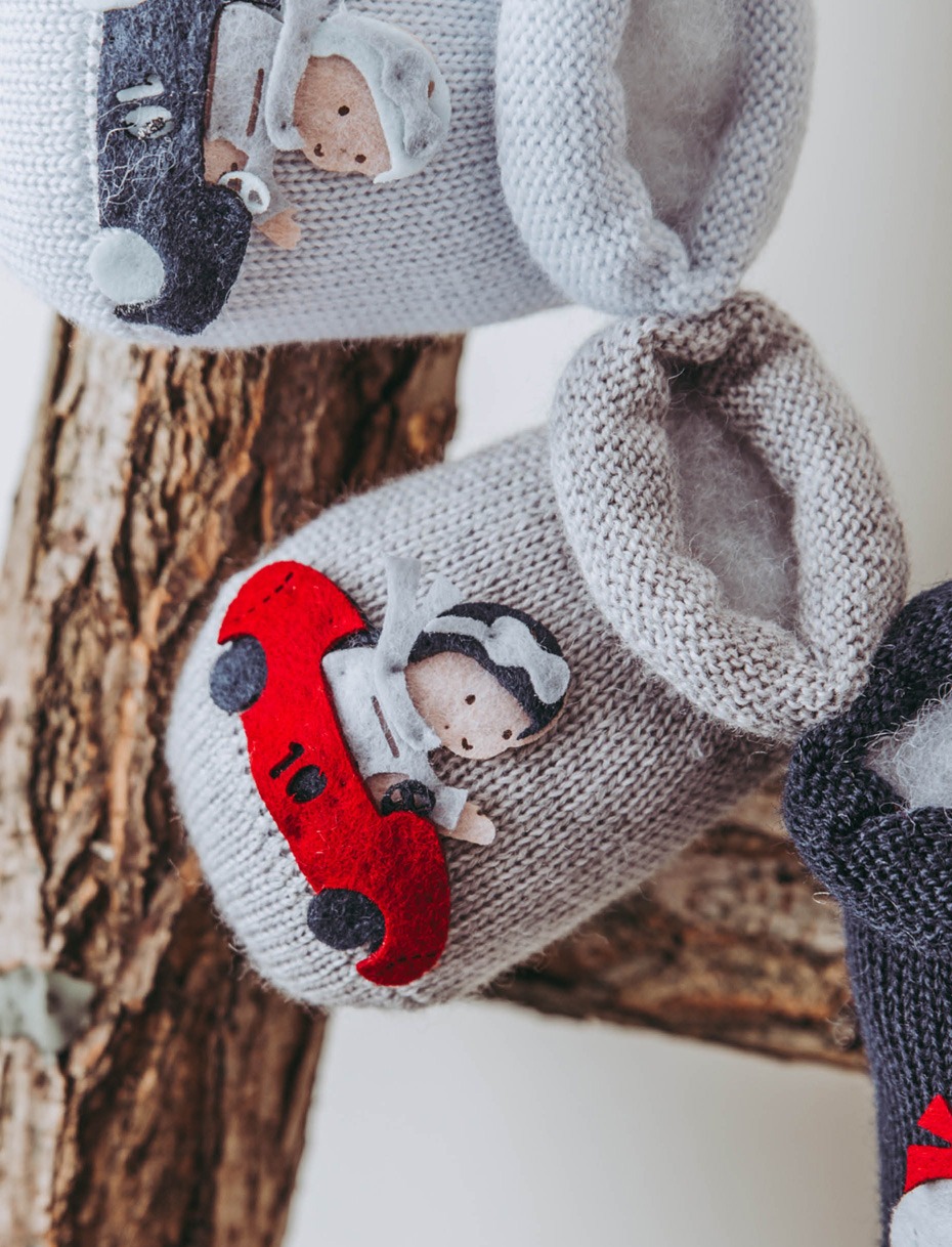 Wool baby booties with toy car 