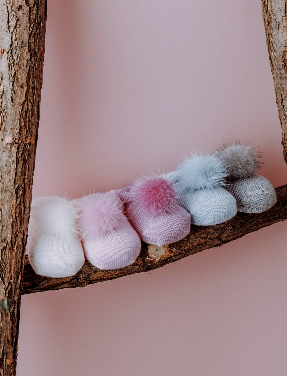 Wool baby booties with soft pom-pom 